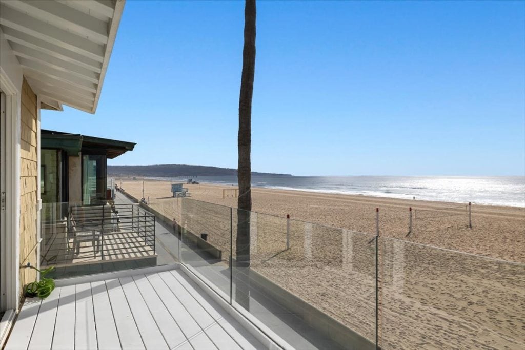 Exterior of 3310 The Strand, Hermosa Beach, a four bedroom house on the sand in north Hermosa, sold September 2023