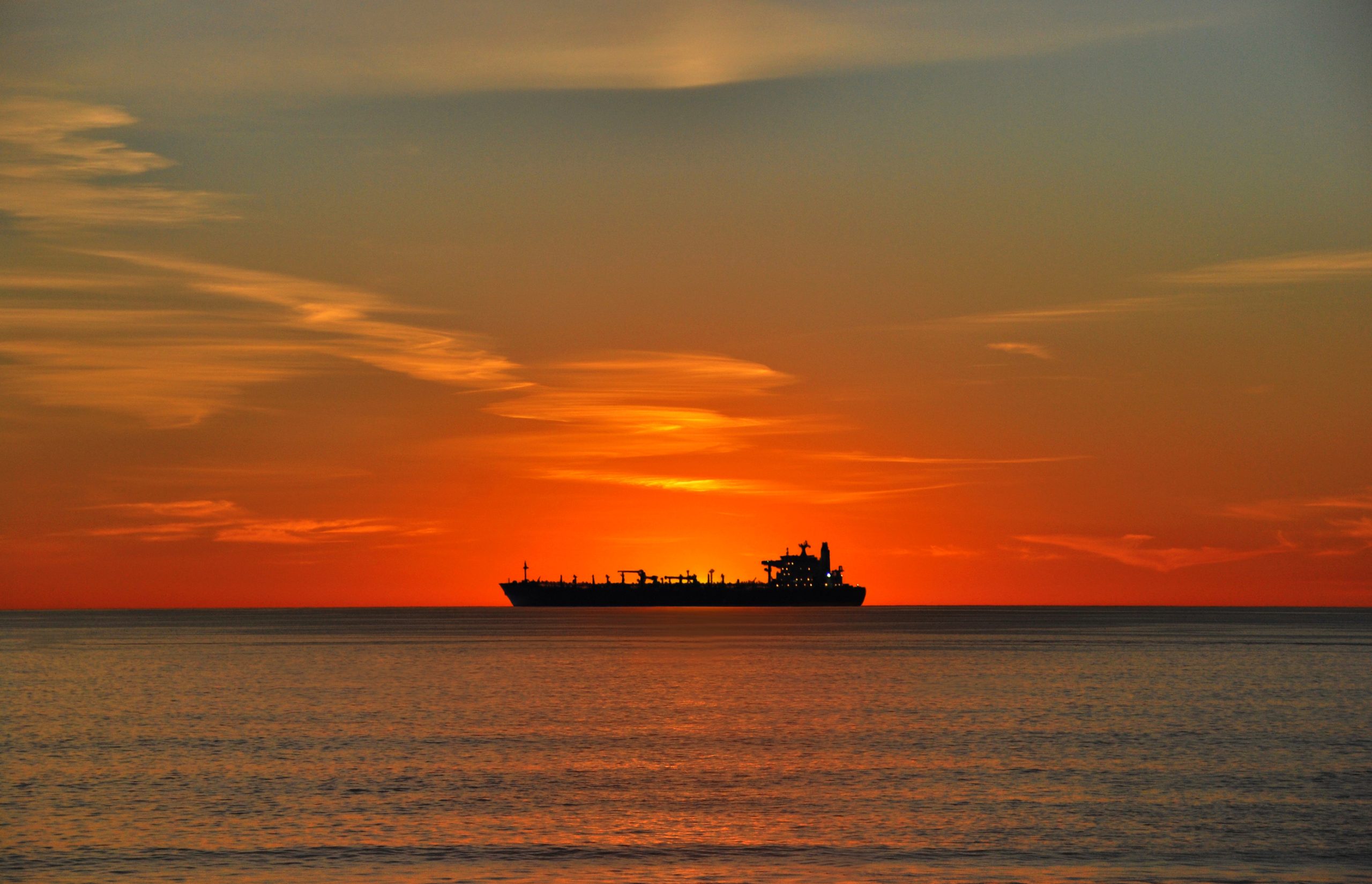 Cargo ship on the horizon seen from El Porto at the north end of Manhattan Beach in the South Bay