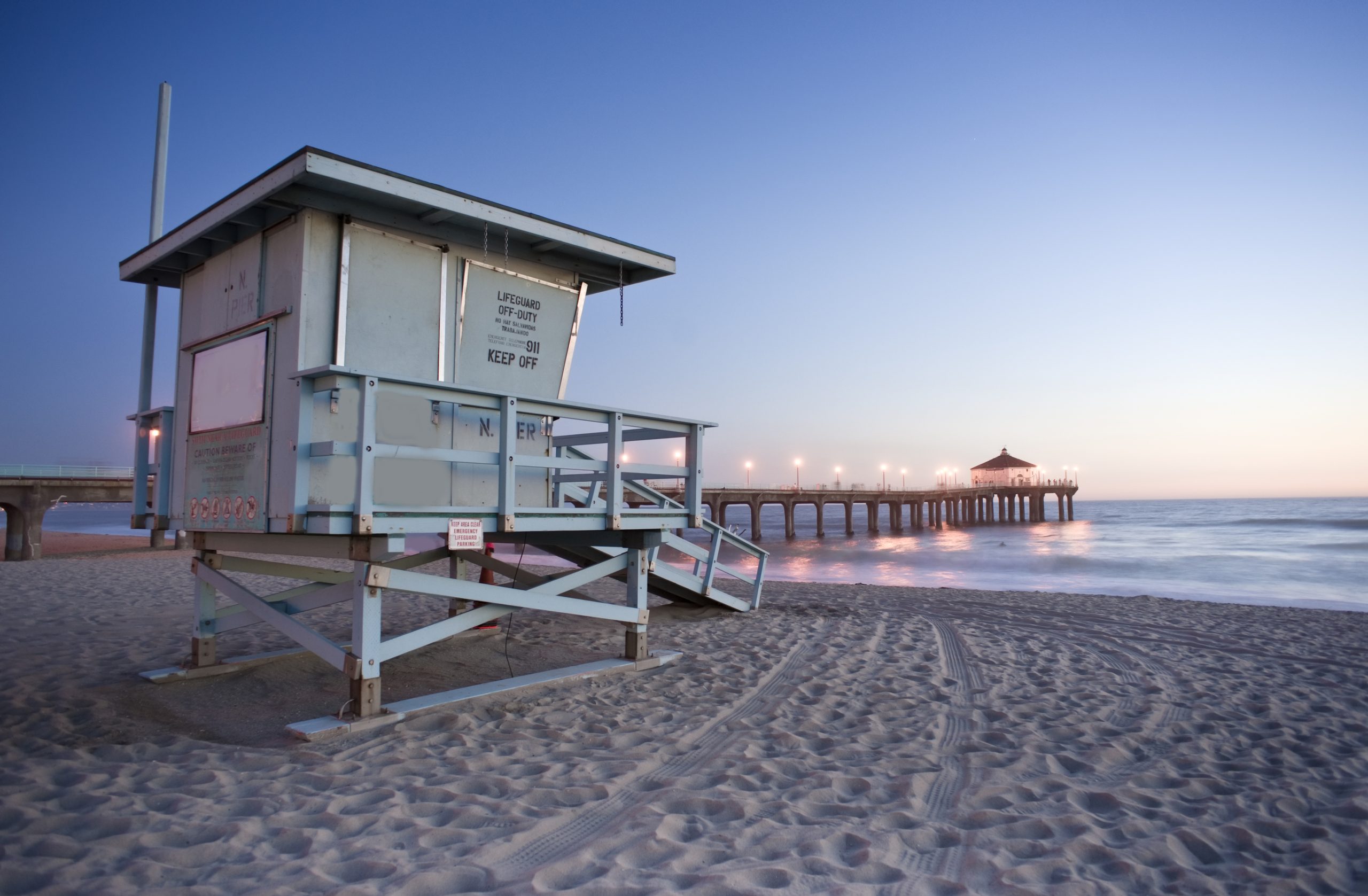 The Manhattan Beach pier at dusk, looking north along the shoreline, Manhattan Beach, California