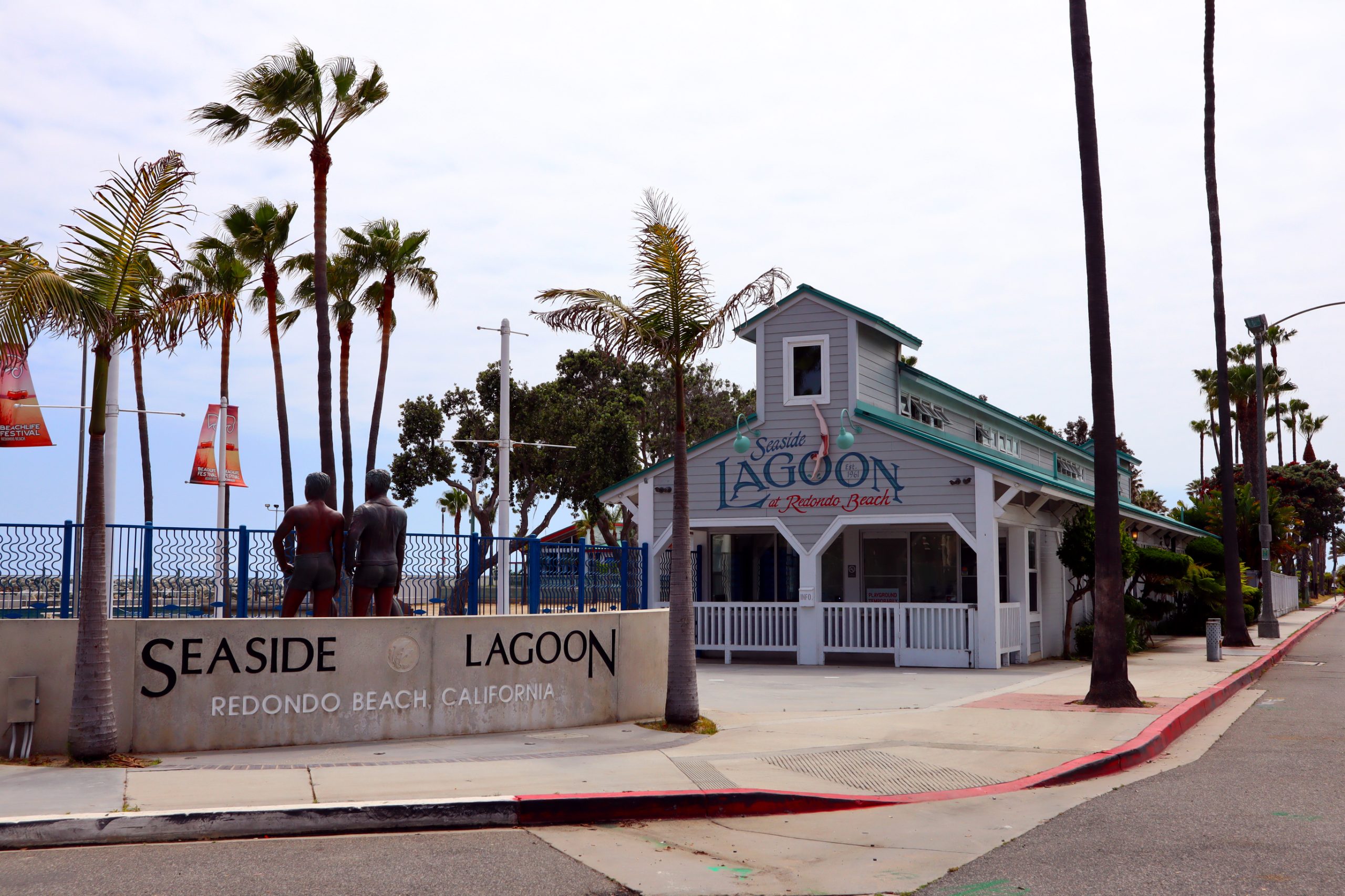 Entrance building and palms at Seaside Lagoon on the Redondo Beach waterfront