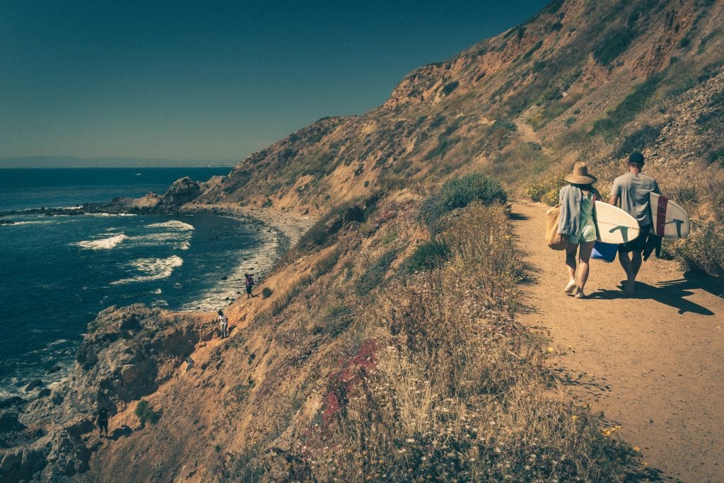 Surfers in the water at Malaga Cove in Palos Verdes Estates on the Palos Verdes Peninsula