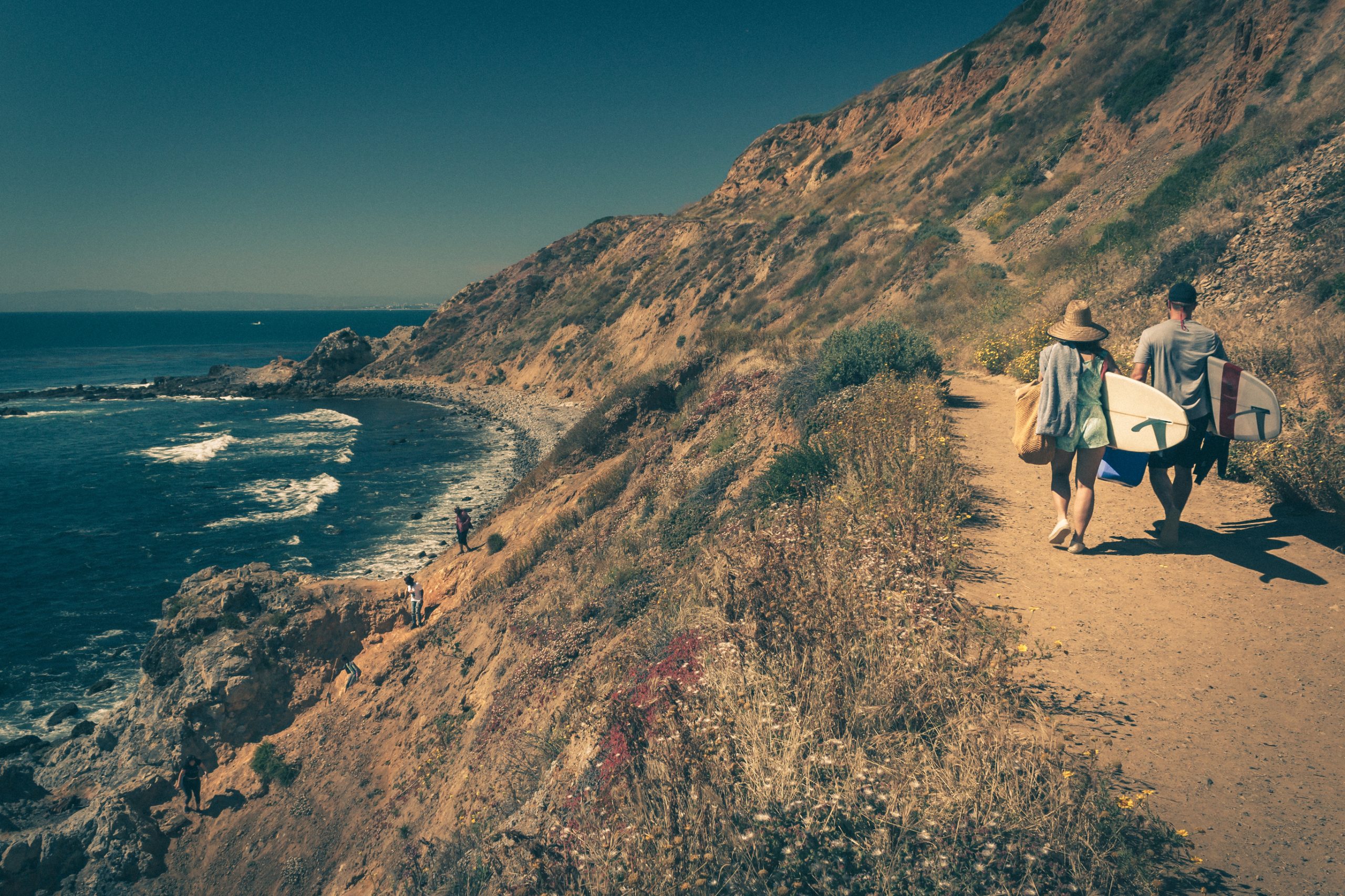 Surfers in the water at Malaga Cove in Palos Verdes Estates on the Palos Verdes Peninsula