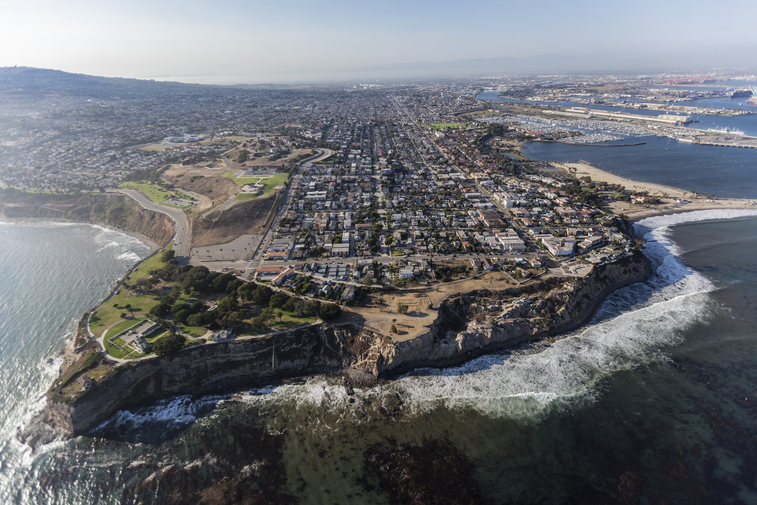 Aerial view of the San Pedro shoreline with the Point Fermin headland and the harbor beyond